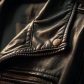 shiny-black-biker-jacket-with-metal-zipper-generated-by-ai-photo